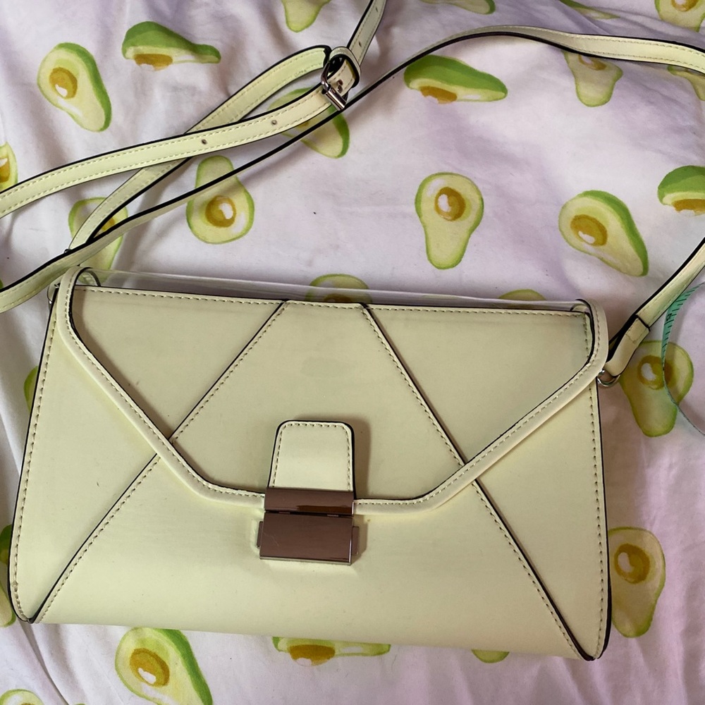 Call It Spring pastel yellow glow handbag